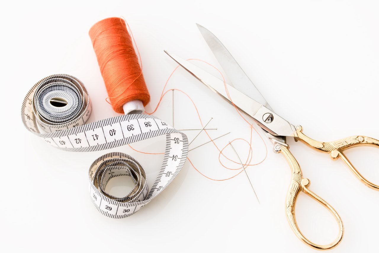 tailor's tools on a desk